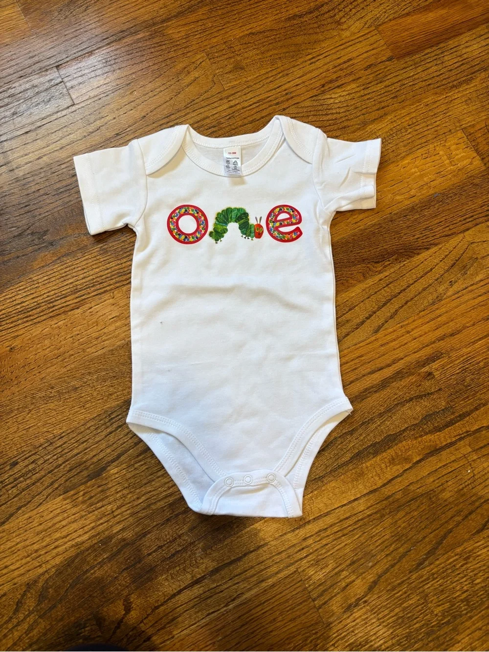 White 'One' Caterpillar Appliqué Baby One-Piece